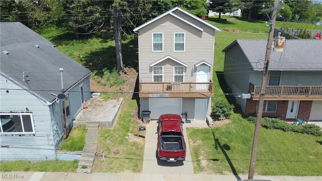 333 Mulberry St, Barnesville, OH 43713 - view of front facade featuring an attached garage and driveway