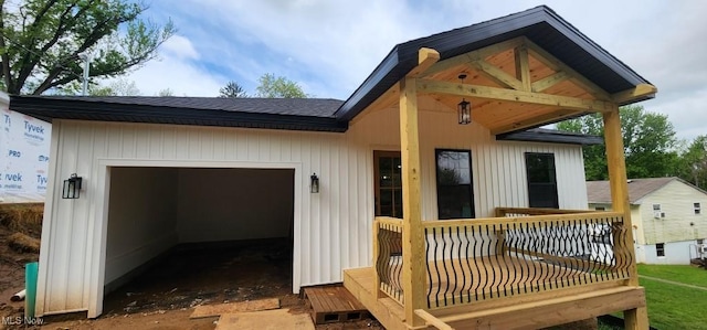 1404 15th St, Vienna, WV 26105 - back of house with an attached garage and a deck