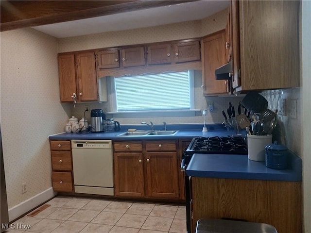 636 4th St, Marietta, OH 45750 - kitchen with dishwasher, a sink, extractor fan, brown cabinetry, and light tile patterned floors