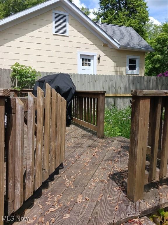 636 4th St, Marietta, OH 45750 - rear view of property featuring a deck and a shingled roof