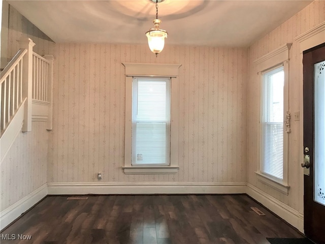 636 4th St, Marietta, OH 45750 - spare room with dark wood-type flooring, plenty of natural light, and stairway