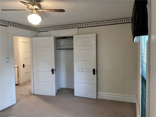 636 4th St, Marietta, OH 45750 - unfurnished bedroom with light carpet, baseboards, a closet, and ceiling fan