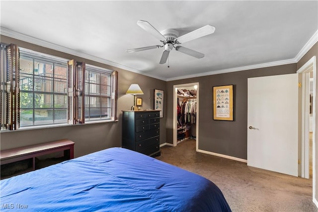 19901 Van Aken Blvd Unit 7, Shaker Heights, OH 44122 - carpeted bedroom featuring a spacious closet, crown molding, ceiling fan, a closet, and baseboards