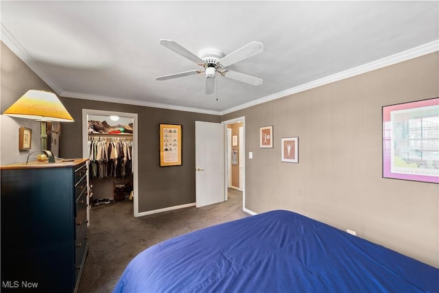 19901 Van Aken Blvd Unit 7, Shaker Heights, OH 44122 - carpeted bedroom featuring a walk in closet, crown molding, baseboards, a ceiling fan, and a closet