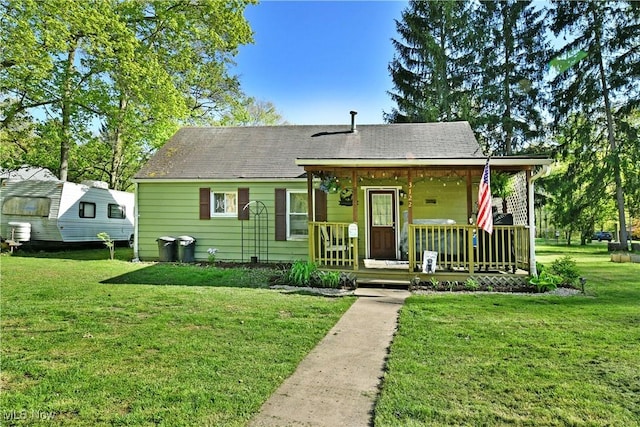 3122 Mccleary Jacoby Rd, Cortland, OH 44410 - view of front of home featuring covered porch and a front yard