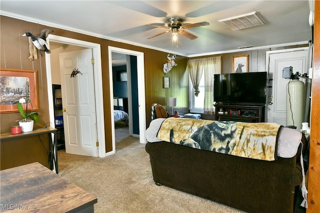 3122 Mccleary Jacoby Rd, Cortland, OH 44410 - carpeted living room featuring ornamental molding, ceiling fan, and wooden walls