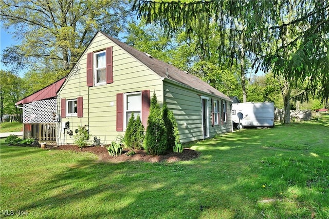 3122 Mccleary Jacoby Rd, Cortland, OH 44410 - view of property exterior with a lawn
