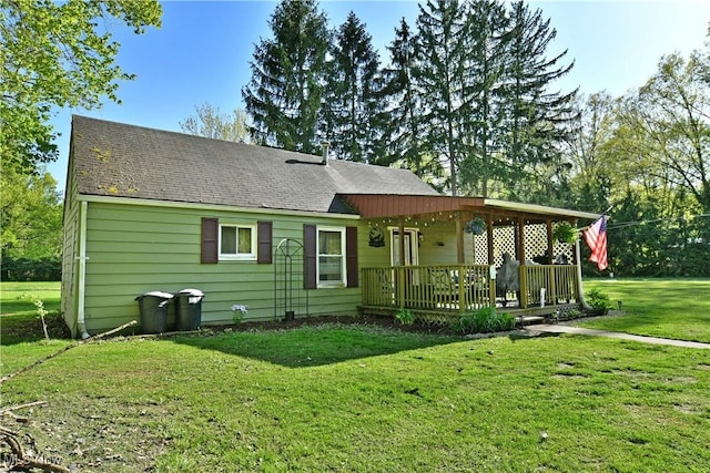 3122 Mccleary Jacoby Rd, Cortland, OH 44410 - rear view of house with a yard and a shingled roof