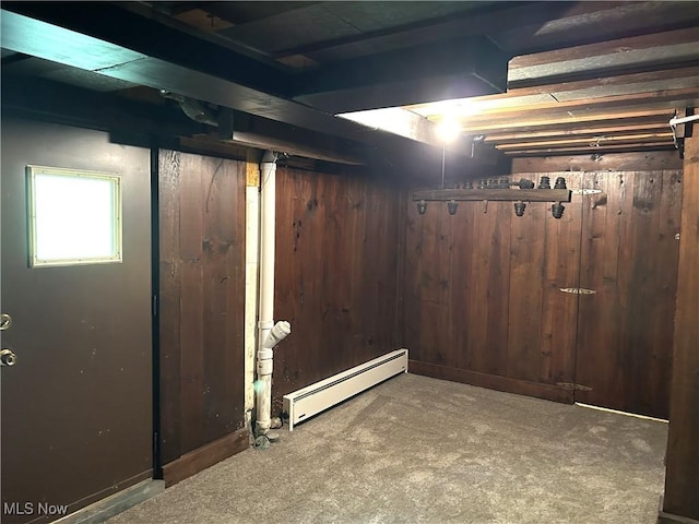 385 Truax Ln, Weirton, WV 26062 - basement with a baseboard heating unit, carpet floors, and wood walls