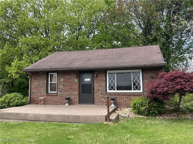 385 Truax Ln, Weirton, WV 26062 - view of front of home featuring brick siding, a front yard, and roof with shingles
