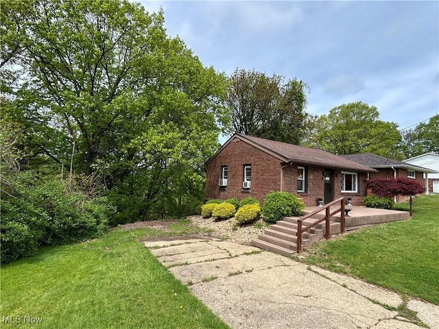 385 Truax Ln, Weirton, WV 26062 - view of front of home featuring brick siding and a front lawn