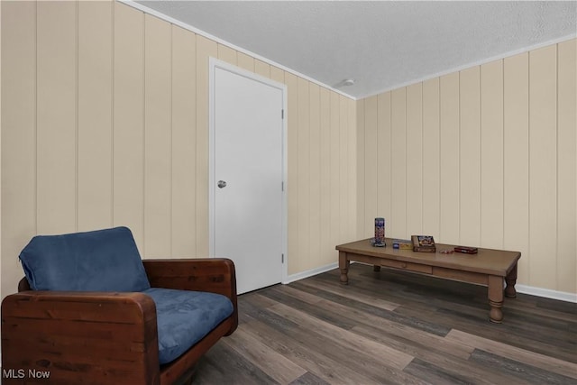 1060 S Watkins Rd, Alexandria, OH 43001 - sitting room with wood finished floors, baseboards, a textured ceiling, and crown molding