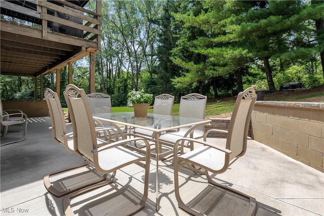 1060 S Watkins Rd, Alexandria, OH 43001 - view of patio featuring outdoor dining area and view of scattered trees
