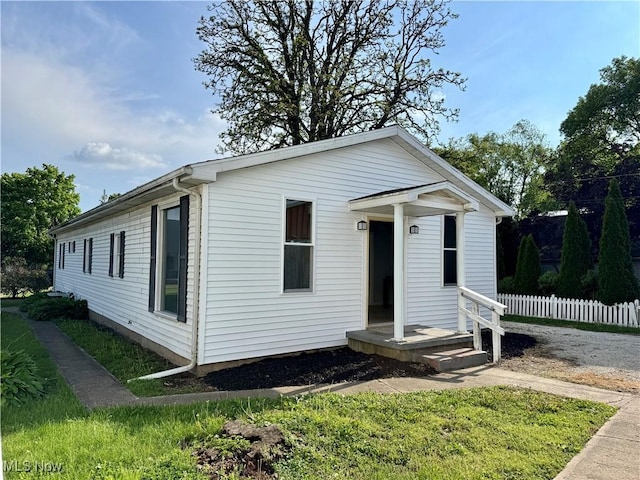 1226 E Main St, Coshocton, OH 43812 - view of front of home with fence