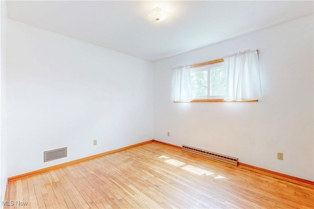 2455 Alexander Mnr E, Steubenville, OH 43952 - unfurnished room featuring hardwood / wood-style flooring and baseboards