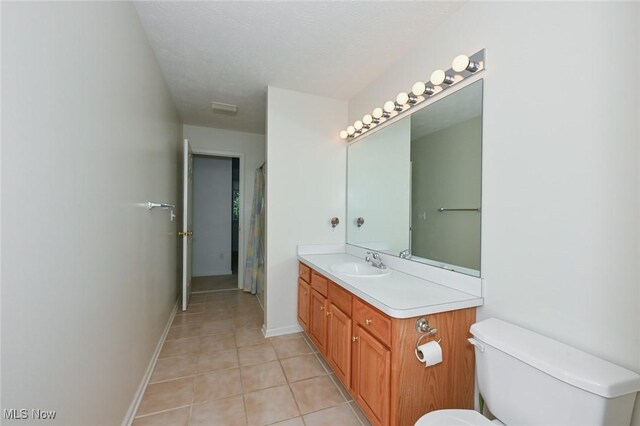 4212 Castle Rdg, Copley, OH 44321 - bathroom with toilet, tile patterned flooring, vanity, baseboards, and a shower with curtain