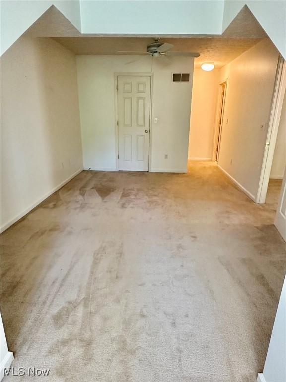 4212 Castle Rdg, Copley, OH 44321 - carpeted spare room with a ceiling fan