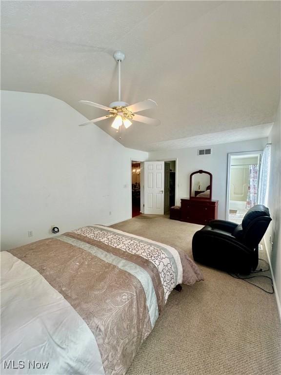4212 Castle Rdg, Copley, OH 44321 - carpeted bedroom with vaulted ceiling and a ceiling fan