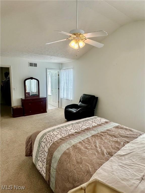 4212 Castle Rdg, Copley, OH 44321 - bedroom with carpet flooring, a ceiling fan, and lofted ceiling