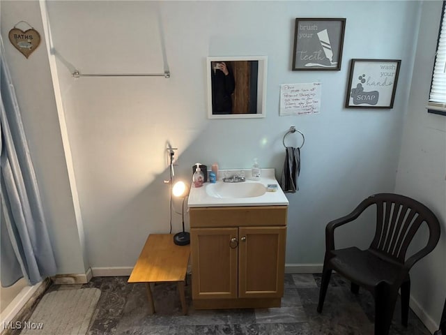 871 Chestnut St, Coshocton, OH 43812 - bathroom with vanity and baseboards