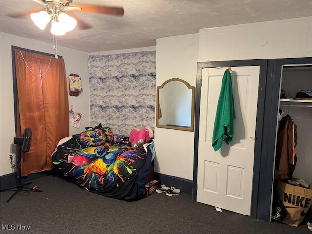 871 Chestnut St, Coshocton, OH 43812 - carpeted bedroom featuring a ceiling fan and a textured ceiling
