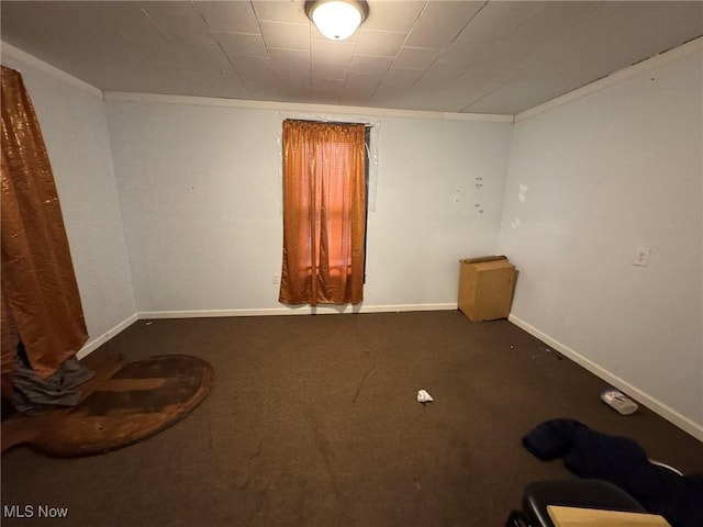 871 Chestnut St, Coshocton, OH 43812 - carpeted empty room with crown molding and baseboards