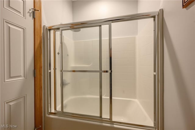 6240 Tim Dr, Wadsworth, OH 44281 - bathroom featuring bath / shower combo with glass door