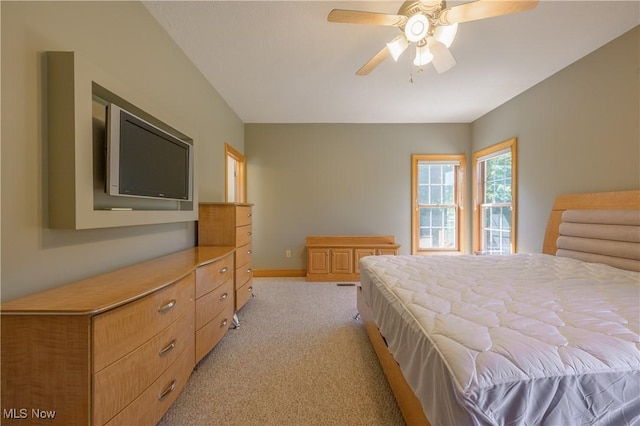 6240 Tim Dr, Wadsworth, OH 44281 - bedroom featuring light colored carpet, baseboards, and a ceiling fan