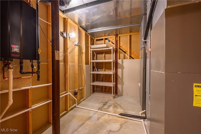 6240 Tim Dr, Wadsworth, OH 44281 - unfinished basement featuring water heater and heating unit