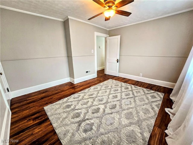105 W 40th St, Shadyside, OH 43947 - unfurnished bedroom with baseboards, wood finished floors, crown molding, and a ceiling fan
