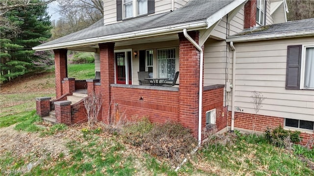 6456 Dover Zoar Rd NE, Dover, OH 44622 - view of side of property with covered porch and a shingled roof
