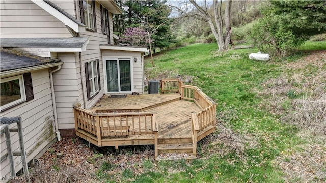 6456 Dover Zoar Rd NE, Dover, OH 44622 - wooden deck featuring central AC unit and a lawn
