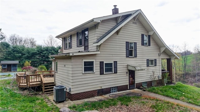 6456 Dover Zoar Rd NE, Dover, OH 44622 - back of house featuring central AC, a deck, and a chimney