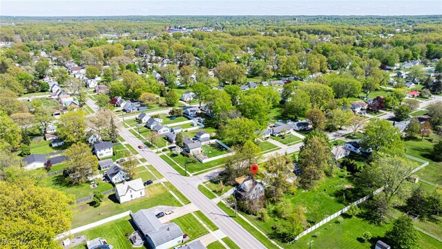 2226 W 13th St, Ashtabula, OH 44004 - aerial view of property and surrounding area featuring nearby suburban area and a heavily wooded area