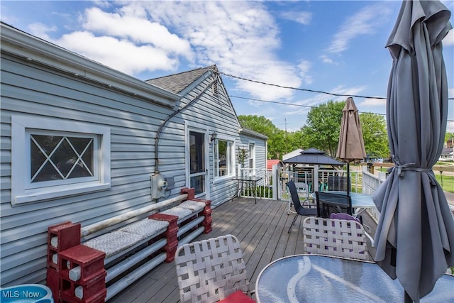 2229 41st St NW, Canton, OH 44709 - deck featuring a gazebo and outdoor dining area