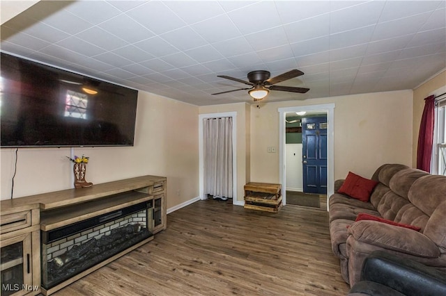 2229 41st St NW, Canton, OH 44709 - living room with wood finished floors, baseboards, and a ceiling fan