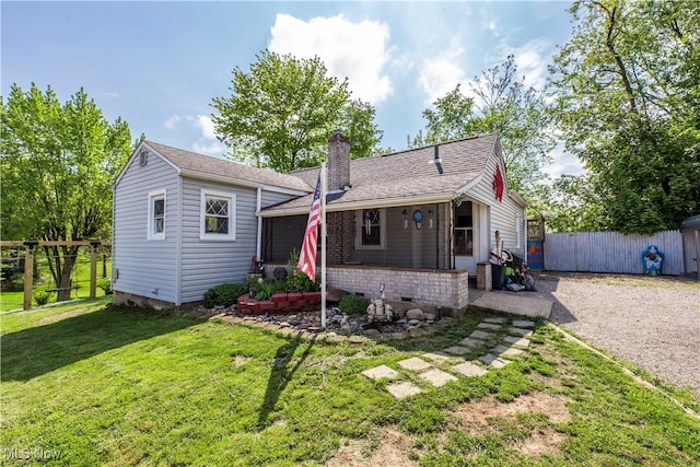 2229 41st St NW, Canton, OH 44709 - view of front of home featuring a chimney and gravel driveway