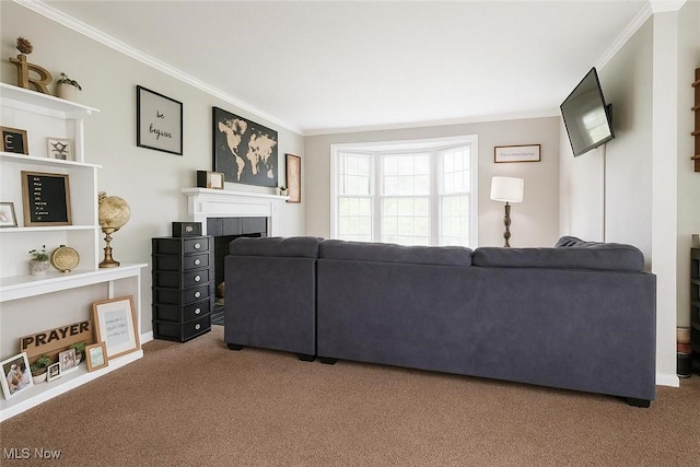 living room with ornamental molding, carpet, a fireplace, and baseboards