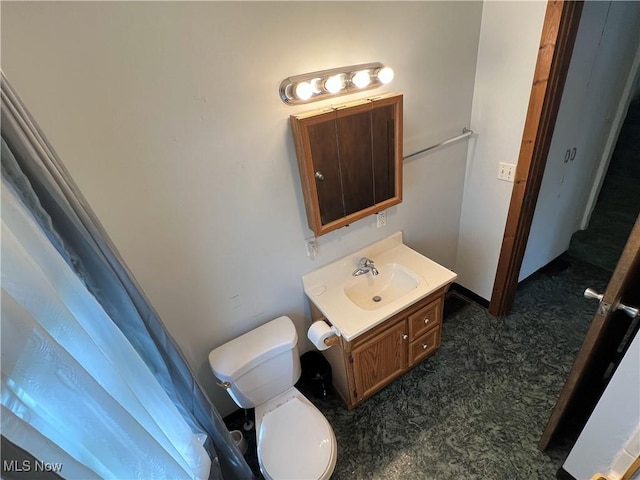 2640 W 19th St, Ashtabula, OH 44004 - bathroom with vanity and toilet