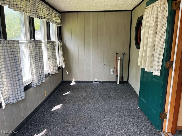 2640 W 19th St, Ashtabula, OH 44004 - carpeted spare room featuring a textured ceiling