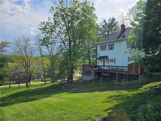 164 W High St, New Concord, OH 43762 - view of green lawn with a deck