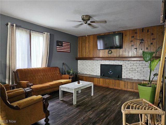 164 W High St, New Concord, OH 43762 - living room featuring ceiling fan and dark wood-style flooring