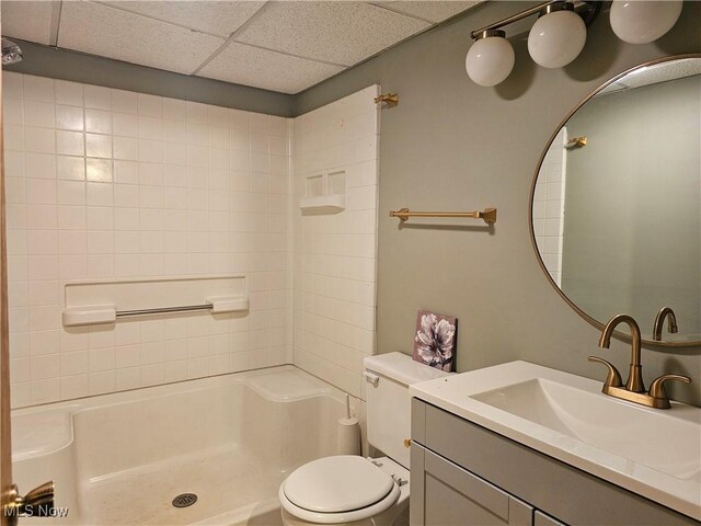 164 W High St, New Concord, OH 43762 - full bathroom featuring a shower, vanity, and a drop ceiling