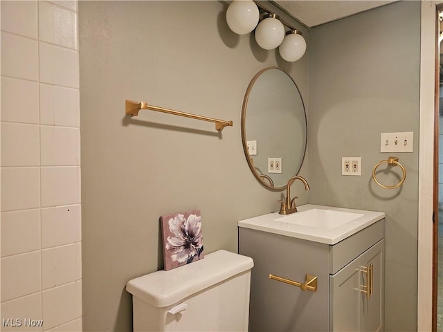 164 W High St, New Concord, OH 43762 - bathroom with toilet and vanity
