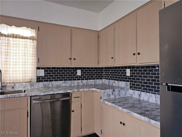 164 W High St, New Concord, OH 43762 - kitchen featuring appliances with stainless steel finishes, a sink, light countertops, and backsplash