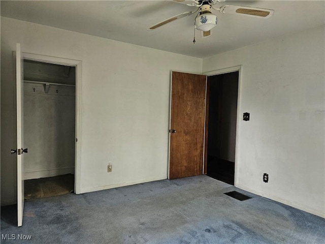164 W High St, New Concord, OH 43762 - unfurnished bedroom with carpet floors and a ceiling fan