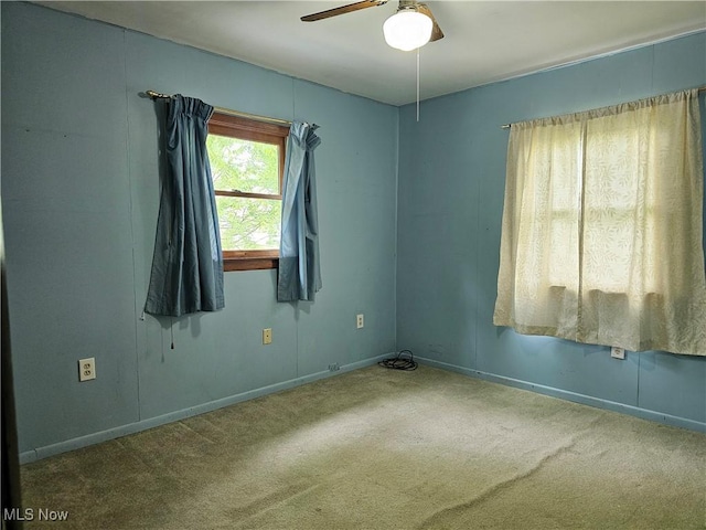 164 W High St, New Concord, OH 43762 - carpeted spare room with a ceiling fan and baseboards