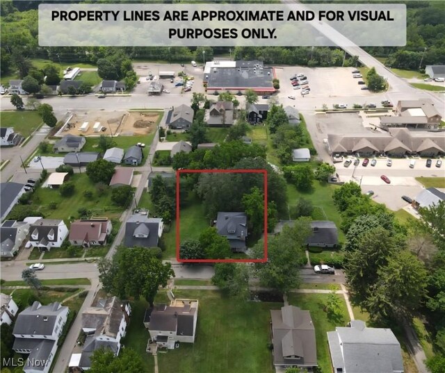 164 W High St, New Concord, OH 43762 - aerial view of residential area with property boundaries highlighted