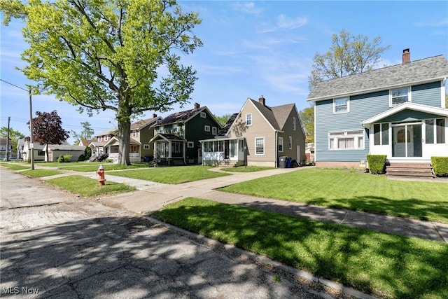 4414 W 171st St, Cleveland, OH 44135 - view of front facade featuring a residential view, a front lawn, and entry steps