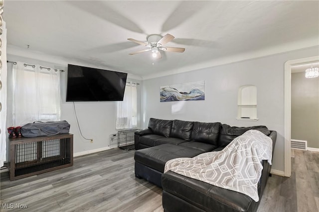 4414 W 171st St, Cleveland, OH 44135 - living room featuring ceiling fan, wood finished floors, and baseboards